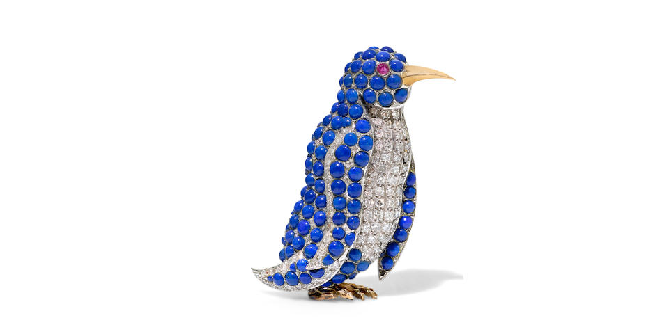A lapis lazuli, diamond, ruby and 18k bi-color gold penguin clip
