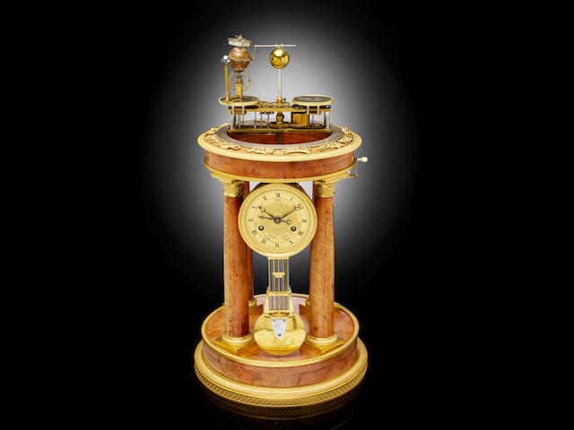 A fine ormolu mounted amboyna orrery clock Raingo &#224; Paris, First quarter 19th century