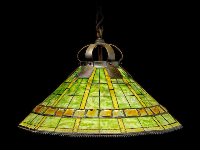Tiffany Studios (1899-1930) Rare Geometric Turtle-Back Banded Hanging Lampcirca 1905leaded glass, Favrile glass, patinated bronze, stamped 'TIFFANY STUDIOS NEW YORK'shade height 18in (46cm); diameter 30in (76cm); chain height 28 1/2in (72cm)