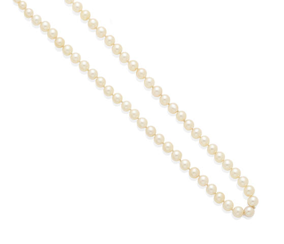A graduated pearl necklace with diamond and platinum clasp, Van Cleef & Arpels, New York