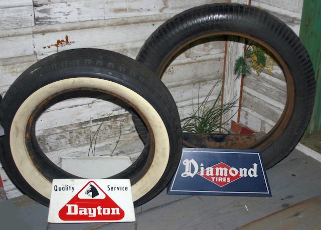 TWO ADVERTISING TIRE STANDS,