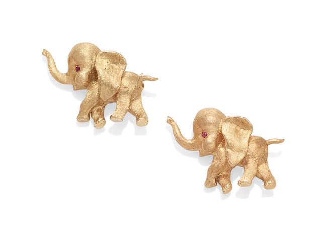 A pair of ruby elephant brooches,  Cartier