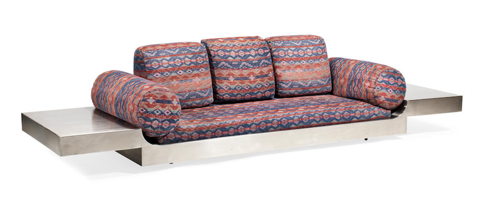 Maria Pergay (born 1930) Daybed1968-69for Design Steel, France, brushed stainless steel, upholstered seat cushionsheight 15in (38cm); width 118in (300cm); depth 39 3/8in (100cm)