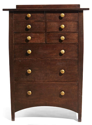 Harvey Ellis (1852-1904); After Chest of Drawerscirca 1910model no. 913, for the Craftsman Workshops of Gustav Stickley, Eastwood, New York, stained curly maple, inlaid with copper and fruitwoods, bronze pulls, faint paper labelheight 50 1/2 (128cm); width 36in (91cm); depth 20in (51cm)