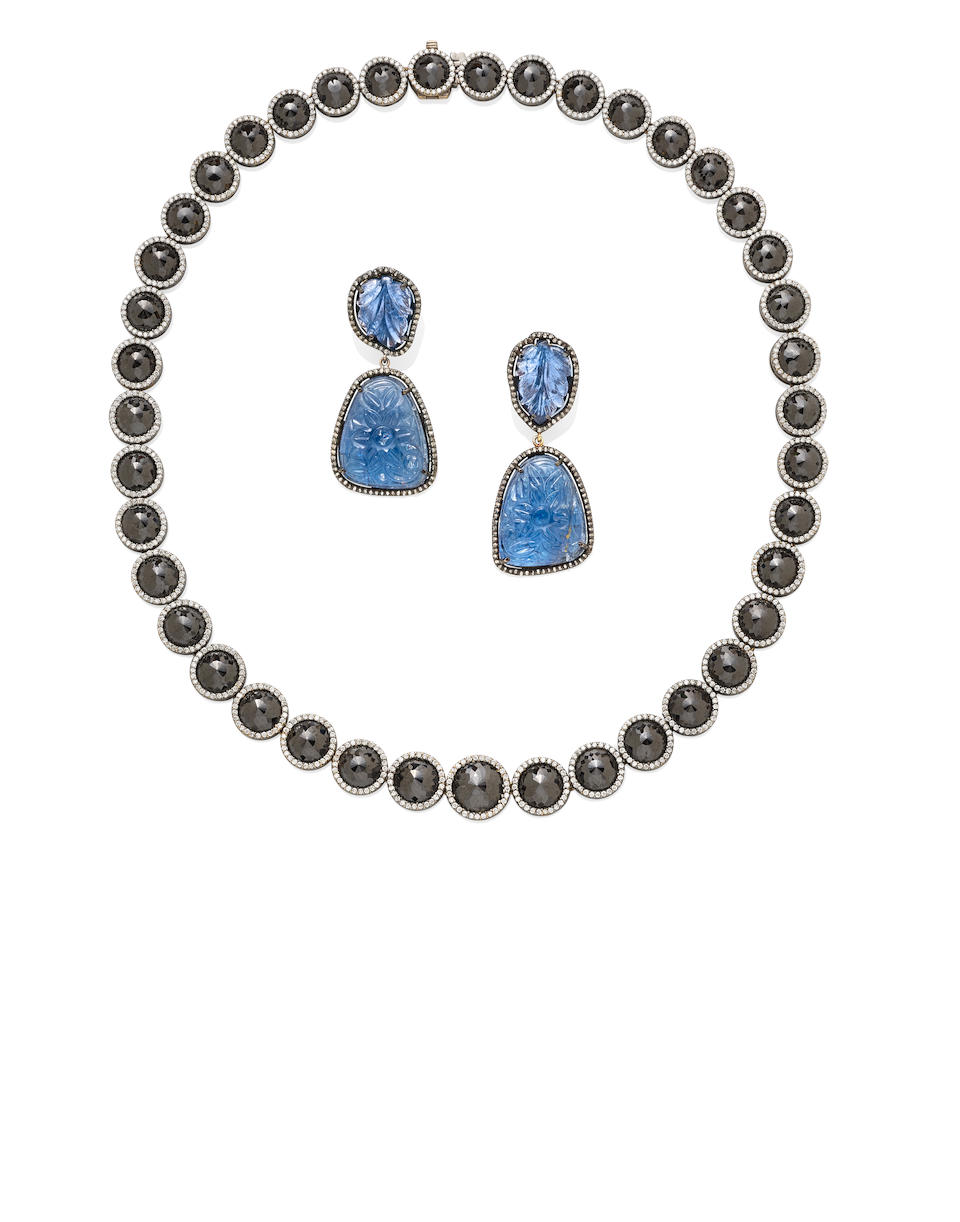 A pair of tanzanite and diamond pendant earrings
