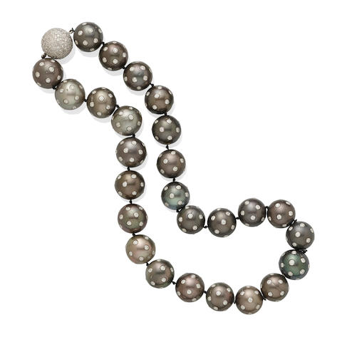 A colored cultured pearl and diamond necklace