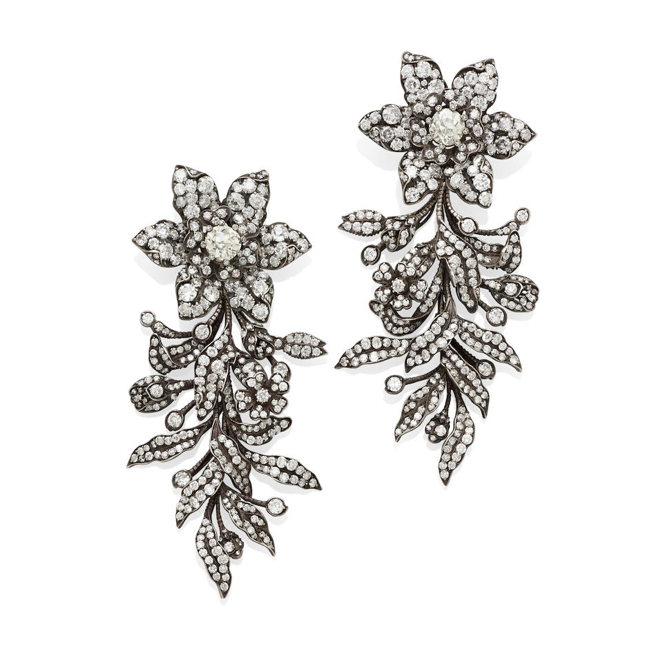A pair of diamond brooches