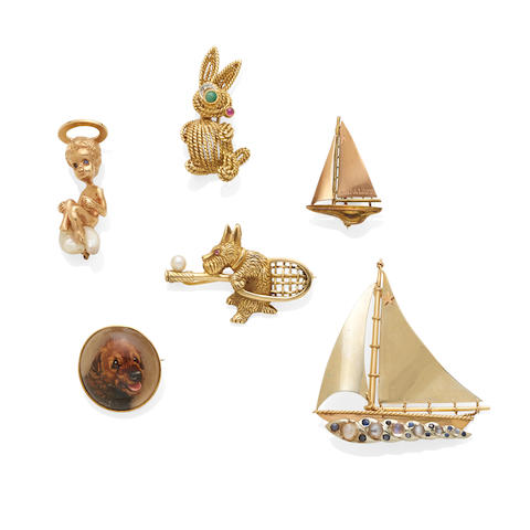 A collection of six gem-set brooches