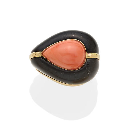A coral and black onyx ring