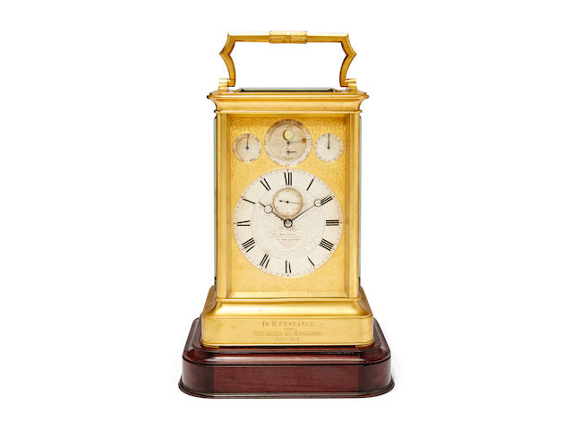 An important gilt giant chronometer escapement quarter chiming carriage clock with perpetual calendar and moon phase, displaying the Equation of Time, on turntable basesigned, M. F. Dent, London, no 24128 Circa 1862