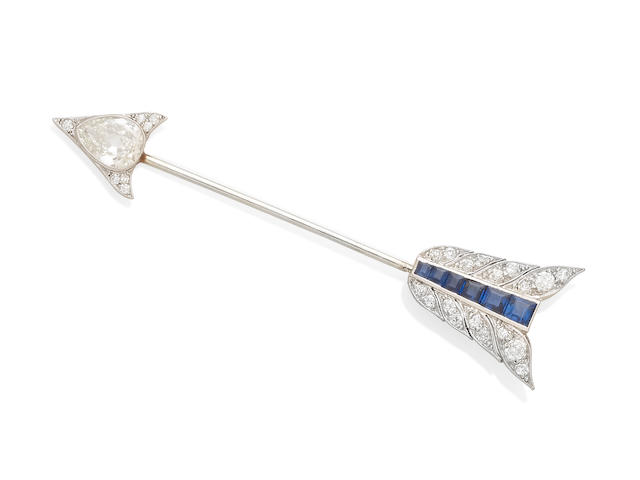 A diamond and sapphire arrow jabot pin