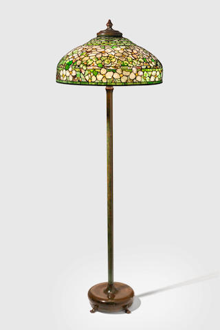 Tiffany Studios (1899-1930) Dogwood Floor Lampcirca 1915leaded glass, patinated bronze, shade stamped 'TIFFANY STUDIOS NEW YORK', base stamped 'TIFFANY STUDIOS NEW YORK 38'height 65in (165cm); diameter of shade 23in (58.5cm)