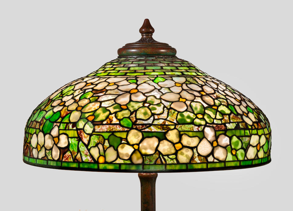 Tiffany Studios (1899-1930) Dogwood Floor Lampcirca 1915leaded glass, patinated bronze, shade stamped 'TIFFANY STUDIOS NEW YORK', base stamped 'TIFFANY STUDIOS NEW YORK 38'height 65in (165cm); diameter of shade 23in (58.5cm)