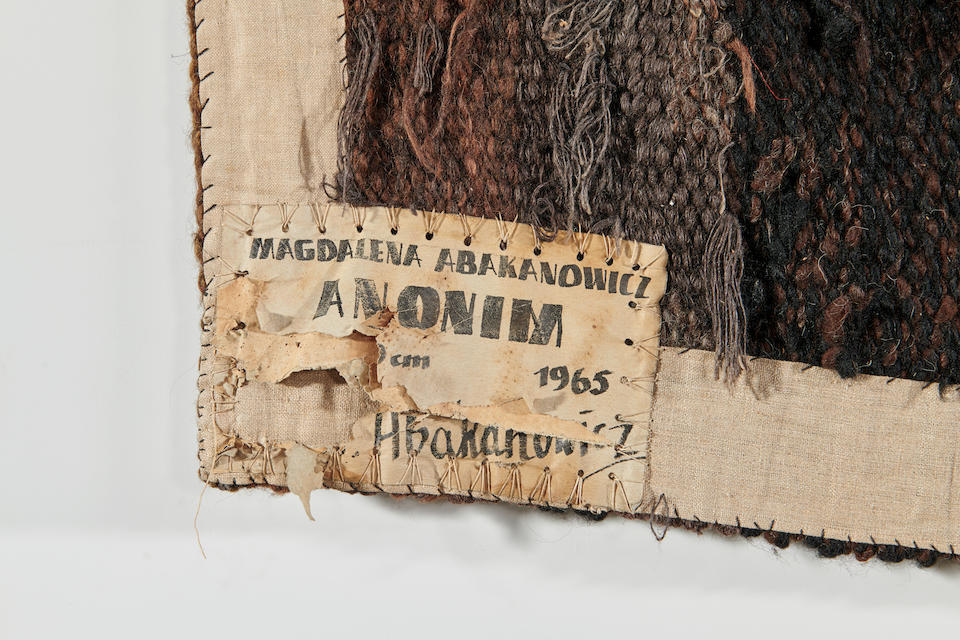 Magdalena Abakanowicz (1930-2017) Anonim1965hand woven wool, cotton and various fibers, ink label to reverse 'MAGDALENA ABAKANOWICZ ANONIM 1965' and signed 'M. Abakanowicz'56 x 41in (142 x 104cm)