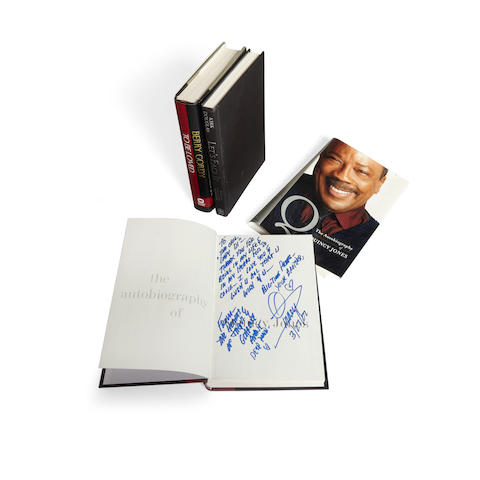 A group of books inscribed by Quincy Jones, Berry Gordy, and Kirk Douglas