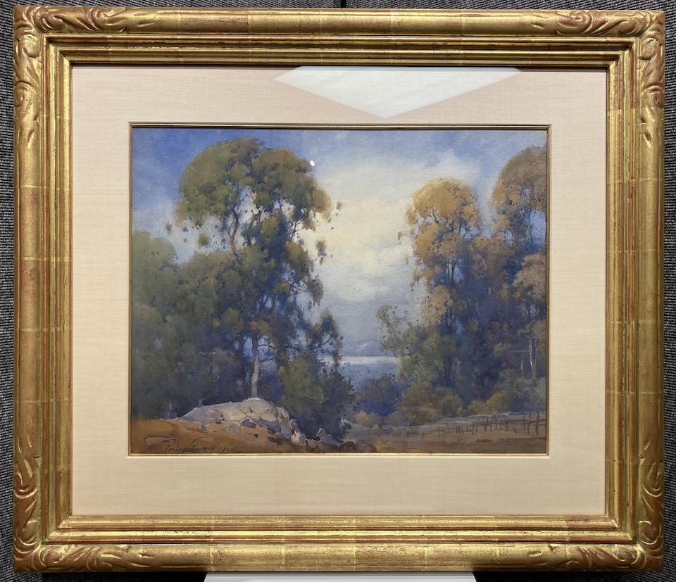 Percy Gray (1869-1952) Trees by a rock outcropping with water in the distance 15 x 19 1/4in framed 26 x 30in (Painted in 1924.)