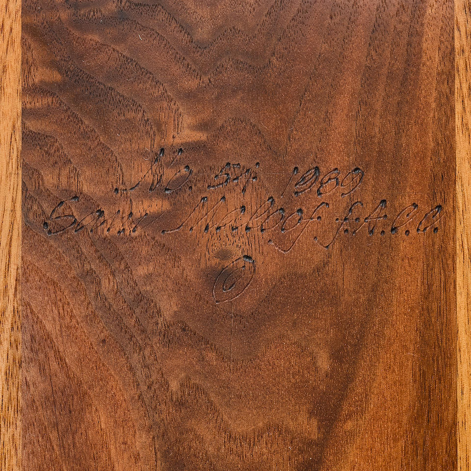 Sam Maloof (1916-2009) Rocking Chair1989inlaid walnut, inscribed 'No. 54 1989' and signed 'Sam Maloof f.A.C.C.' with the copyright symbol underneath the seatheight 45in (114.3); width 26 1/2in (67.3cm); length 45in (114.3)