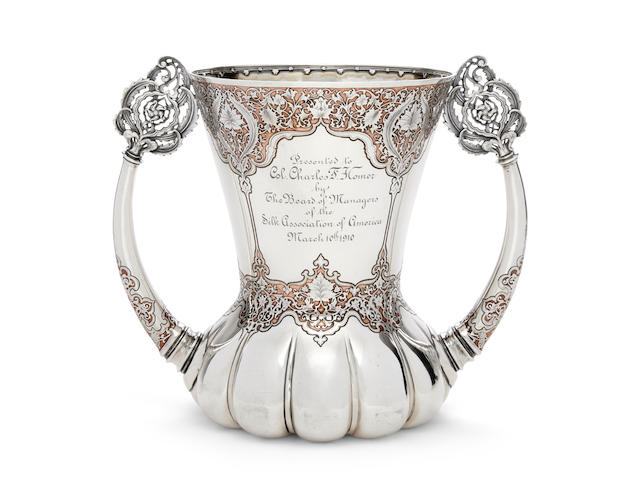 AN EXCEPTIONAL STERLING SILVER AND COPPER LOVING CUP by Tiffany & Co., New York, NY, marked 10209 Makers 3350, 1902-1907