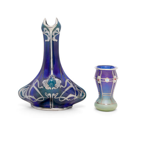 Loetz (1890-1920) Vasecirca 1900silver overlay and jeweled, iridescent glass, together with an Art Nouveau silver overlay porcelain vaseheight of Loetz vase 4 1/2in (11cm); height of Art Nouveau vase 9 1/2in