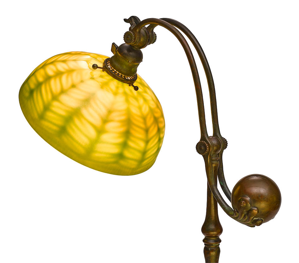Tiffany Studios (1899-1930) Counterbalance Floor Lampcirca 1910patinated bronze, green Favrile glass, shade engraved 'L.C.T. Favrile', base stamped 'TIFFANY STUDIOS NEW YORK 468'height of base 56in (142.2cm); diameter of shade 10in (26cm)