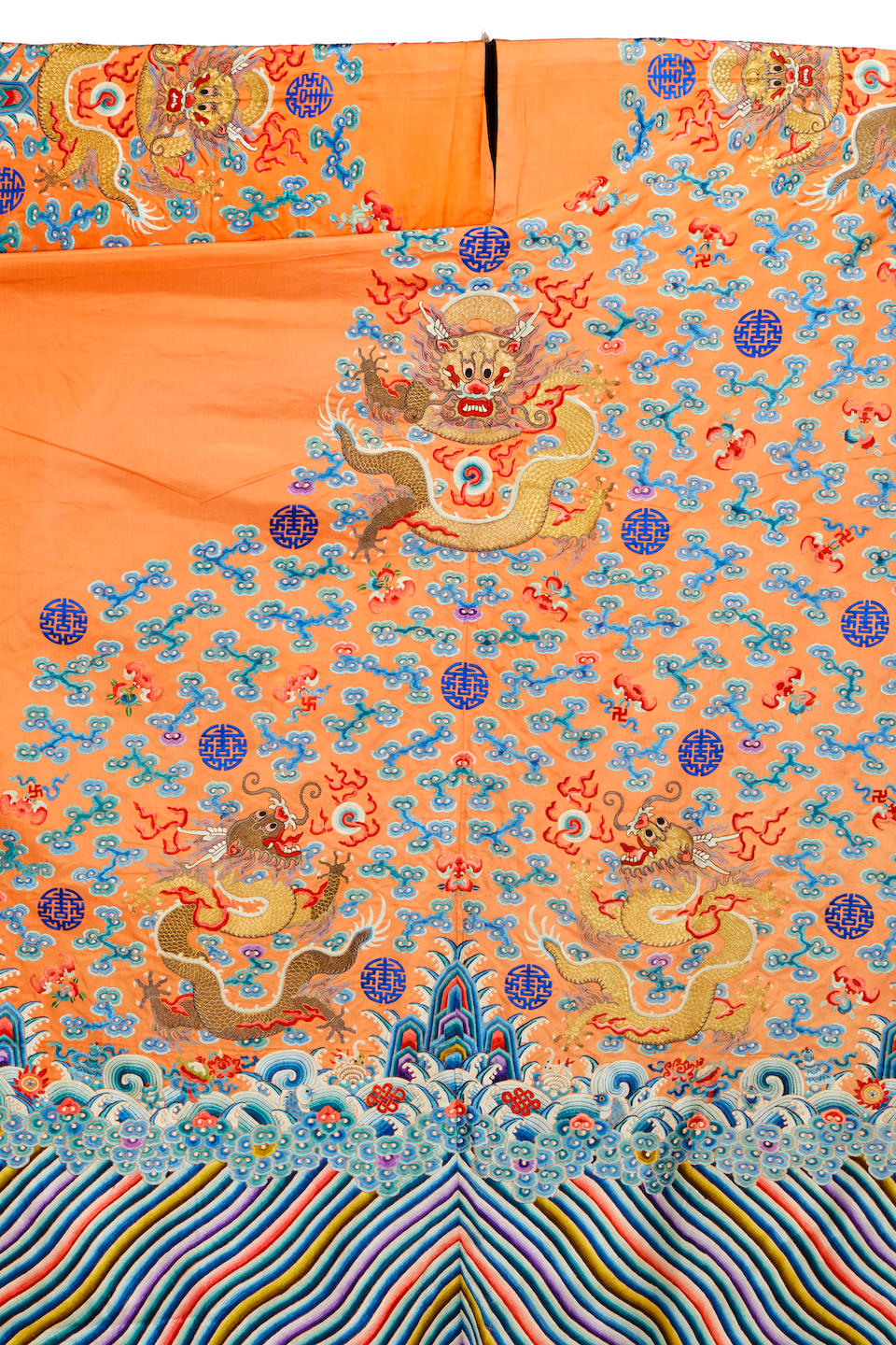 AN UNCUT APRICOT GROUND EMBROIDERED SILK YARDAGE FOR A COURT ROBE Late Qing dynasty