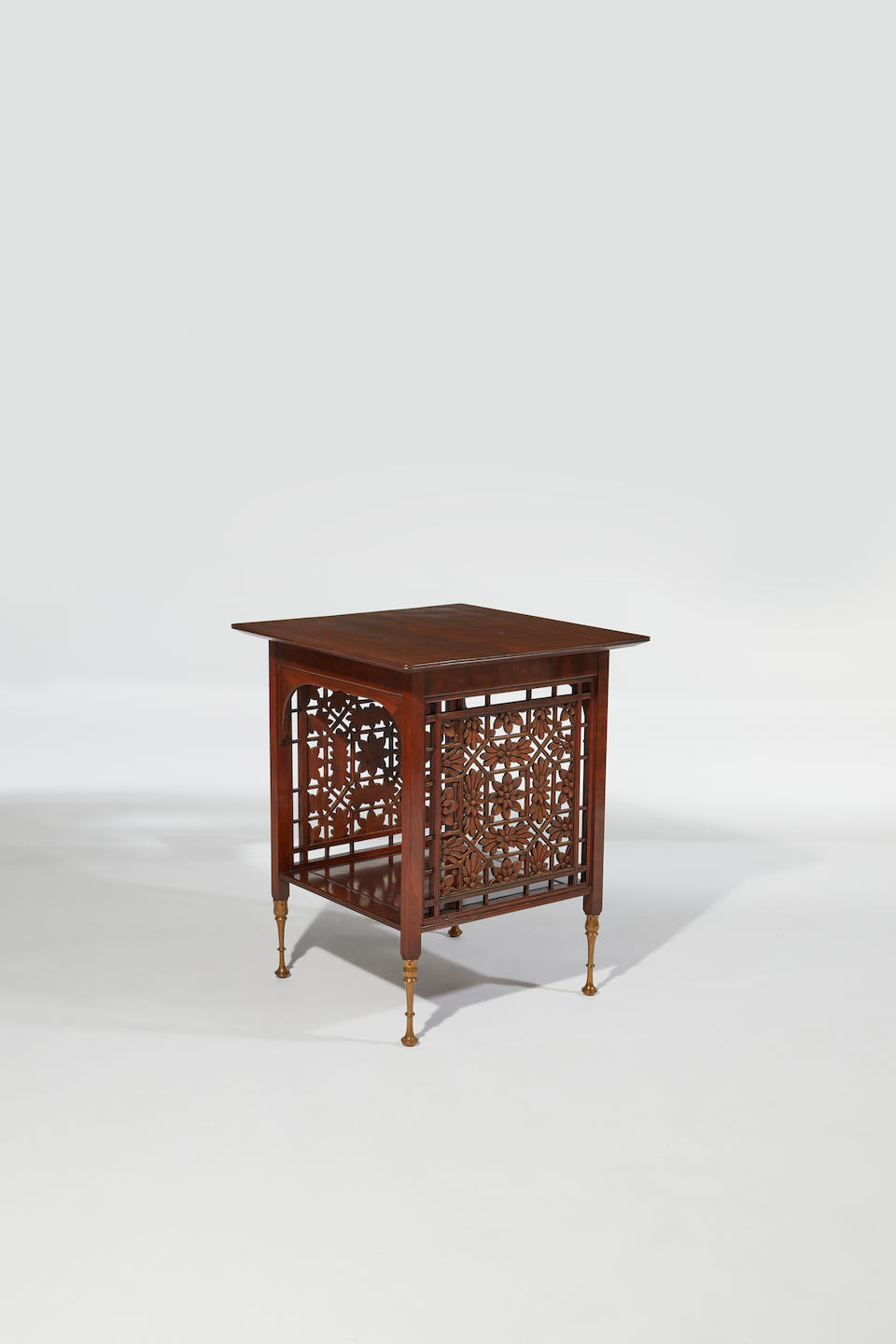 LOUIS C. Tiffany & Co., Associated Artists; Attributed to  Rare Side Table, circa 1880incorporating Lockwood de Forest panels, fustic, teak, brassheight 26in (66cm); width 21&#188;in (54cm); depth 21&#188; in (54cm)