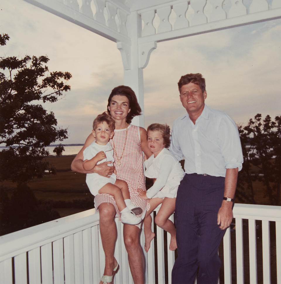 KENNEDY FAMILY PHOTOS, INCLUDING THREE FROM DAVID POWERS. 5 original photographs depicting John and Jackie with their young children, including:
