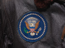 Thumbnail of J.F.K.'S AIR FORCE ONE BOMBER JACKET GIVEN TO DAVID POWERS. An original U.S. Government issue G-1 flight jacket, with sewn patch of the Seal of the President of the United States over the right breast, originally owned by President John F. Kennedy and gifted to David Powers circa 1962-1963, image 7