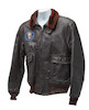 Thumbnail of J.F.K.'S AIR FORCE ONE BOMBER JACKET GIVEN TO DAVID POWERS. An original U.S. Government issue G-1 flight jacket, with sewn patch of the Seal of the President of the United States over the right breast, originally owned by President John F. Kennedy and gifted to David Powers circa 1962-1963, image 1