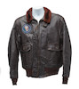 Thumbnail of J.F.K.'S AIR FORCE ONE BOMBER JACKET GIVEN TO DAVID POWERS. An original U.S. Government issue G-1 flight jacket, with sewn patch of the Seal of the President of the United States over the right breast, originally owned by President John F. Kennedy and gifted to David Powers circa 1962-1963, image 8