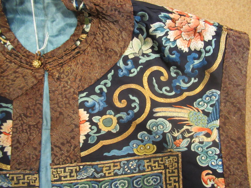 A WOMAN'S EMBROIDERED WEDDING VEST, XIAPEI  Late 19th century