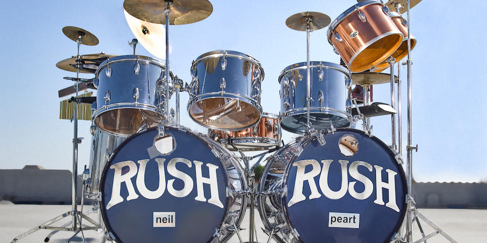 NEIL PEART'S CHROME SLINGERLAND DRUM KIT USED WITH RUSH FROM 1974-1977.