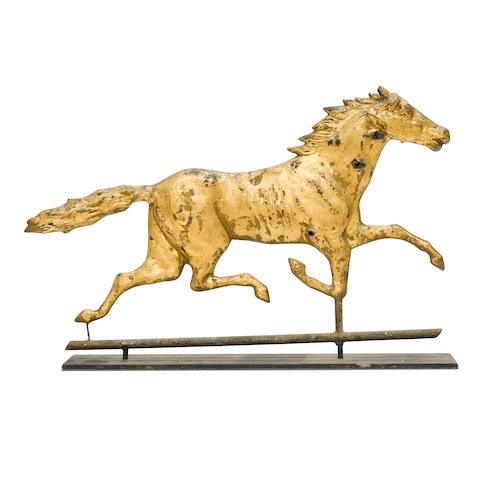 A MOLDED GILT COPPER RUNNING HORSE WEATHERVANELate 19th/early 20th century