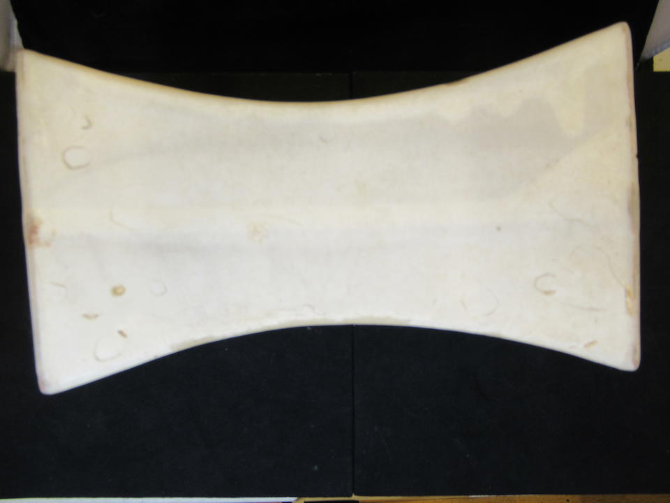 A Rare Imperially-Inscribed white-glazed ingot-shaped pillow The pillow Song Dynasty (960-1279), the inscribed poem dated 1746