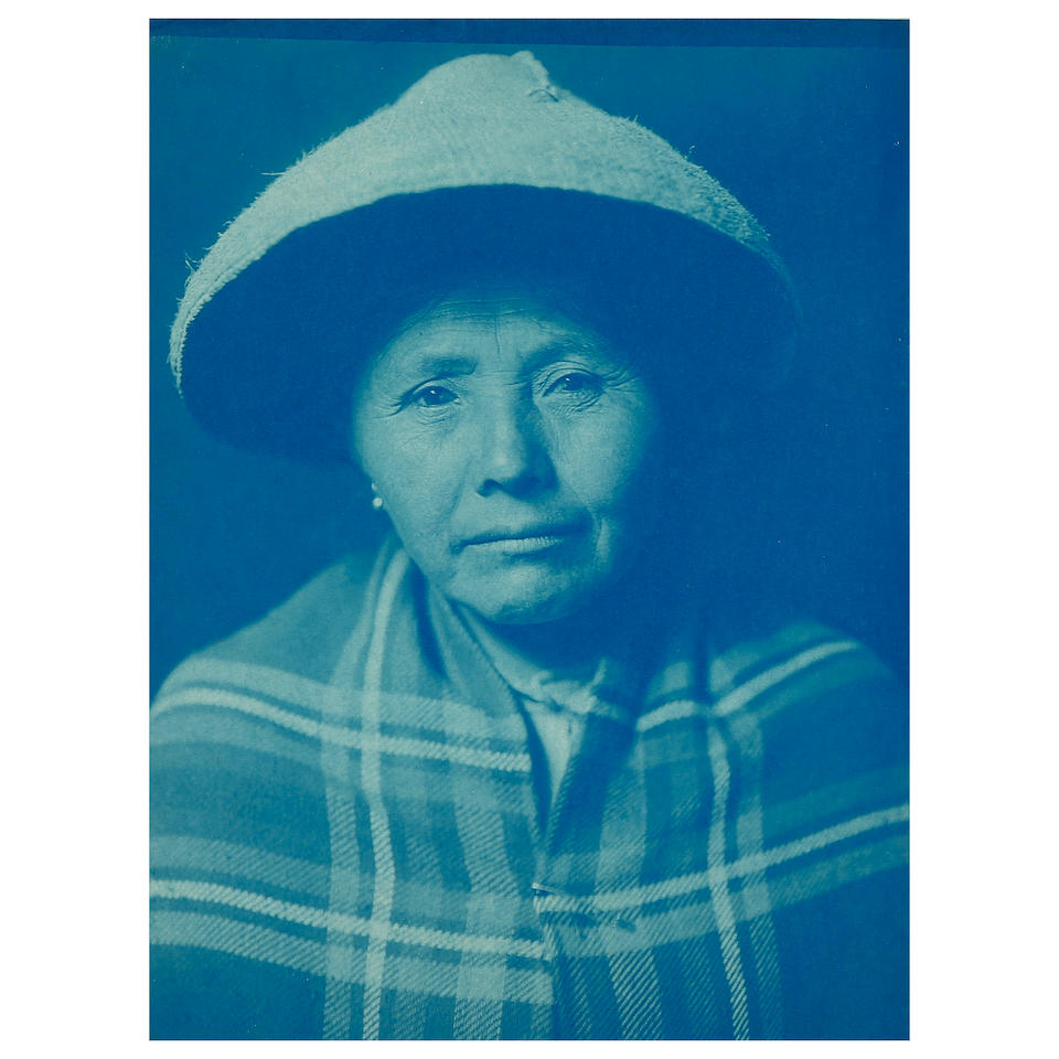 CURTIS CYANOTYPES FROM VOLUME IX OF THE NORTH AMERICAN INDIAN. 23 cyanotypes with images of Quinault and Tahola tribe members, including portraits, still lifes, and photographs made en plein air of fishing and boating, many of which are related to or variants of published images,