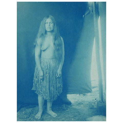 CURTIS CYANOTYPES FROM VOLUME IX OF THE NORTH AMERICAN INDIAN. 23 cyanotypes with images of Quinault and Tahola tribe members, including portraits, still lifes, and photographs made en plein air of fishing and boating, many of which are related to or variants of published images,