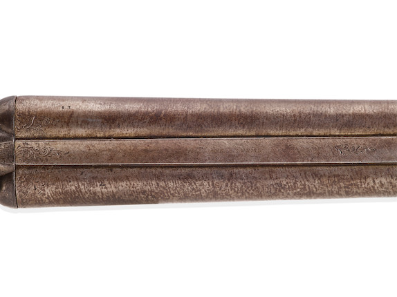 BILLY THE KID WHITNEY DOUBLE BARREL HAMMER SHOTGUN TAKEN FROM DEPUTY BOB OLINGER AND USED TO KILL HIM DURING BILLY THE KID'S DRAMATIC LINCOLN COUNTY COURTHOUSE ESCAPE ON APRIL 28, 1881.  Serial no. 903, circa 1880, 10 gauge 25 1/4 inch round brown Damascus twist pattern. image 10