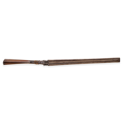 BILLY THE KID WHITNEY DOUBLE BARREL HAMMER SHOTGUN TAKEN FROM DEPUTY BOB OLINGER AND USED TO KILL HIM DURING BILLY THE KID'S DRAMATIC LINCOLN COUNTY COURTHOUSE ESCAPE ON APRIL 28, 1881.  Serial no. 903, circa 1880, 10 gauge 25 1/4 inch round brown Damascus twist pattern. image 7