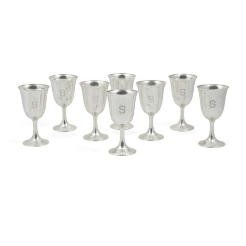 EIGHT AMERICAN STERLING SILVER CUPS AND A PITCHER by various makers, 20th century