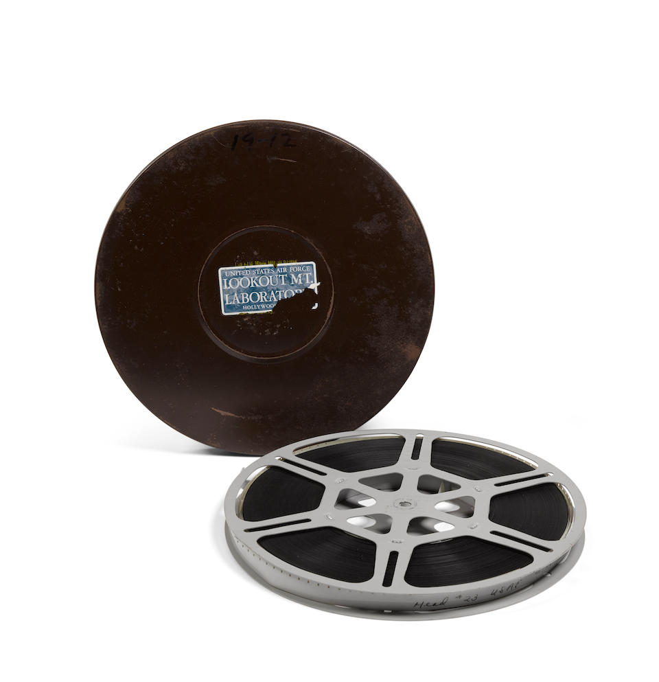 OPERATION SANDSTONE FORMERLY CLASSIFIED FILM. 10 1/2-inch metal reel of 16mm film in canister marked 19-12, with Lookout Mt. label, about 750 feet of film,