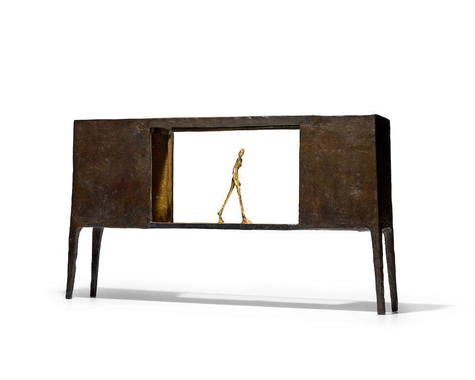 ALBERTO GIACOMETTI (1901-1966) Figurine entre deux maisons 11 5/8 x 21 x 3 11/16 in (29.5 x 53.3 x 9.4 cm) (Conceived in 1950. This bronze version cast in 1952 by the Alexis Rudier Foundry in an edition of 6, of which two are numbered 6/6)