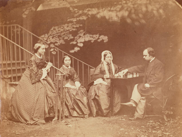 DODGSON, CHARLES LUTWIDGE (LEWIS CARROLL). 1832-1898. Original albumen print photograph, approximately 6 7/8 x 8 3/4 inches, Chelsea, London, October 7, 1863, of the Rossetti Family at home,