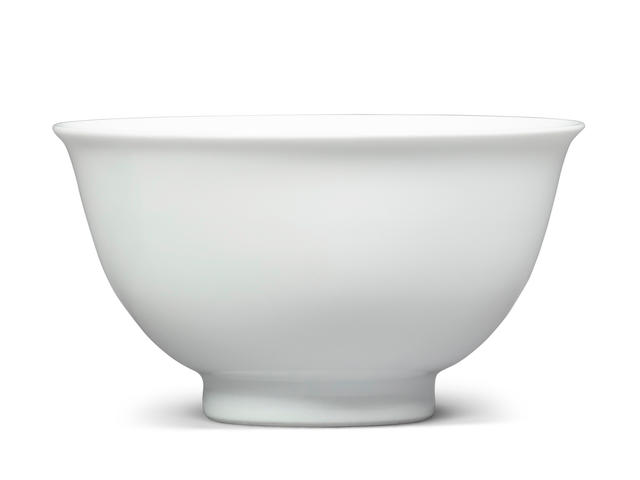 A fine small-white glazed bowl Kangxi mark and of the period
