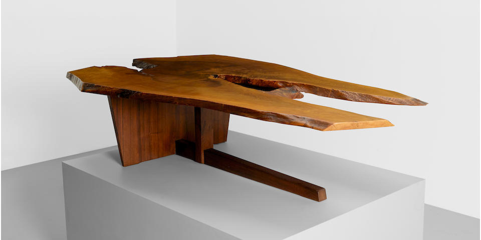 GEORGE NAKASHIMA (1905-1990) Important Minguren II Coffee Table 1972Persian walnut with free edges and fissures with one East Indian rosewood butterfly joint, American black walnut height 18in (36cm); width 75in (190cm); depth 45in (114cm)
