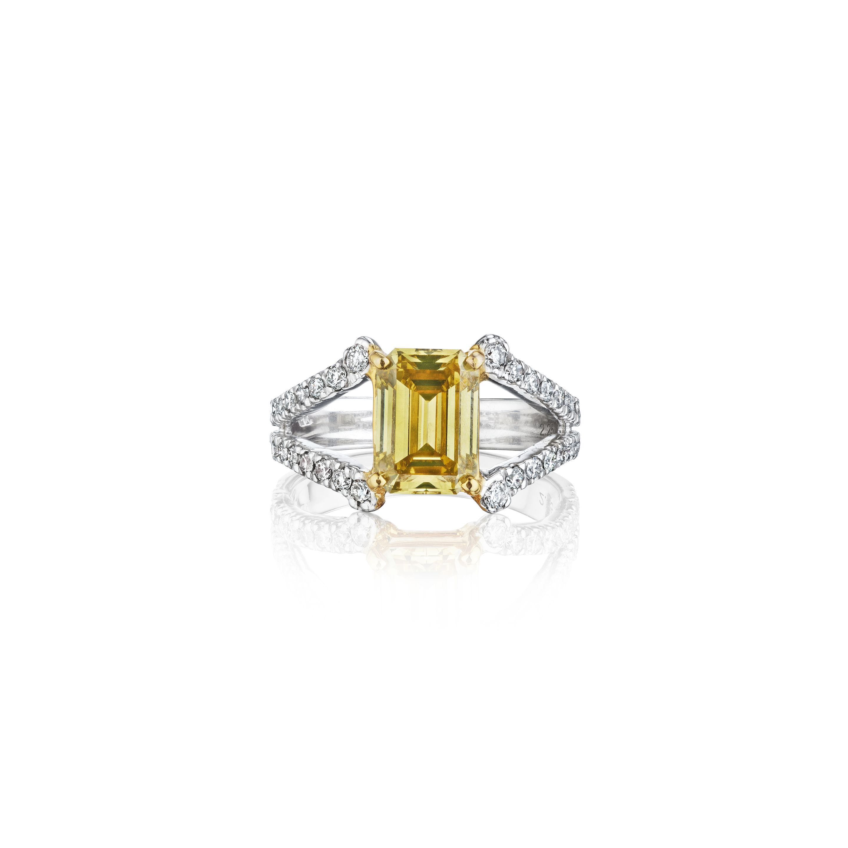 A COLORED DIAMOND RING