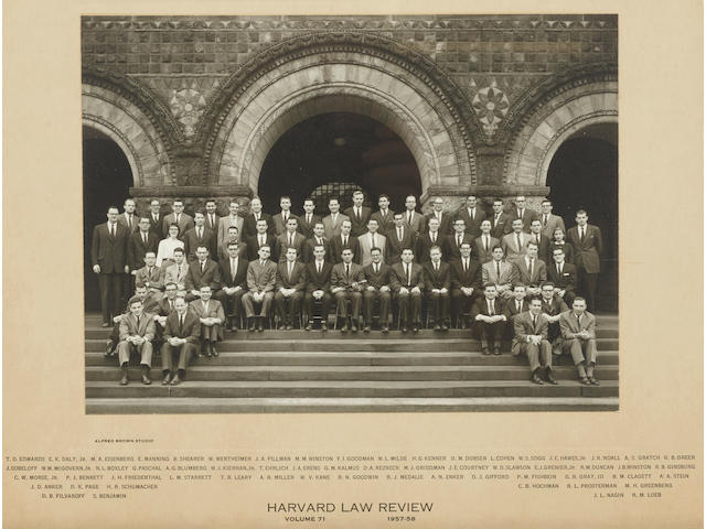 RUTH BADER GINSBURG'S COPY OF THE 1957-58 HARVARD LAW REVIEW PHOTOGRAPH. Gelatin silver print photograph, 180 x 240 mm laid down to 280 x 330 mm mount and framed, of the members of the 1957-58 Harvard Law Review team standing on the steps of Austin Hall,