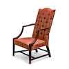 Thumbnail of A FEDERAL MAHOGANY UPHOLSTERED LOLLING CHAIREastern Massachusetts, possibly Boston or Salem, circa 1790 image 1