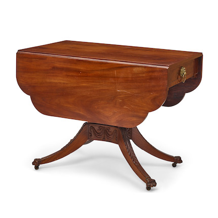 A FEDERAL CARVED MAHOGANY DROP LEAF TABLENew York, early 19th century image 1