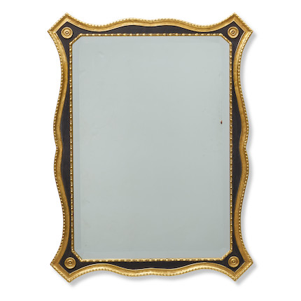 A PARCEL EBONIZED AND GILTWOOD MIRROR20th century image 1
