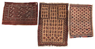 Thumbnail of Two Baluch Rugs and a Yomud Chuval Iran and Turkestan Various sizes image 1